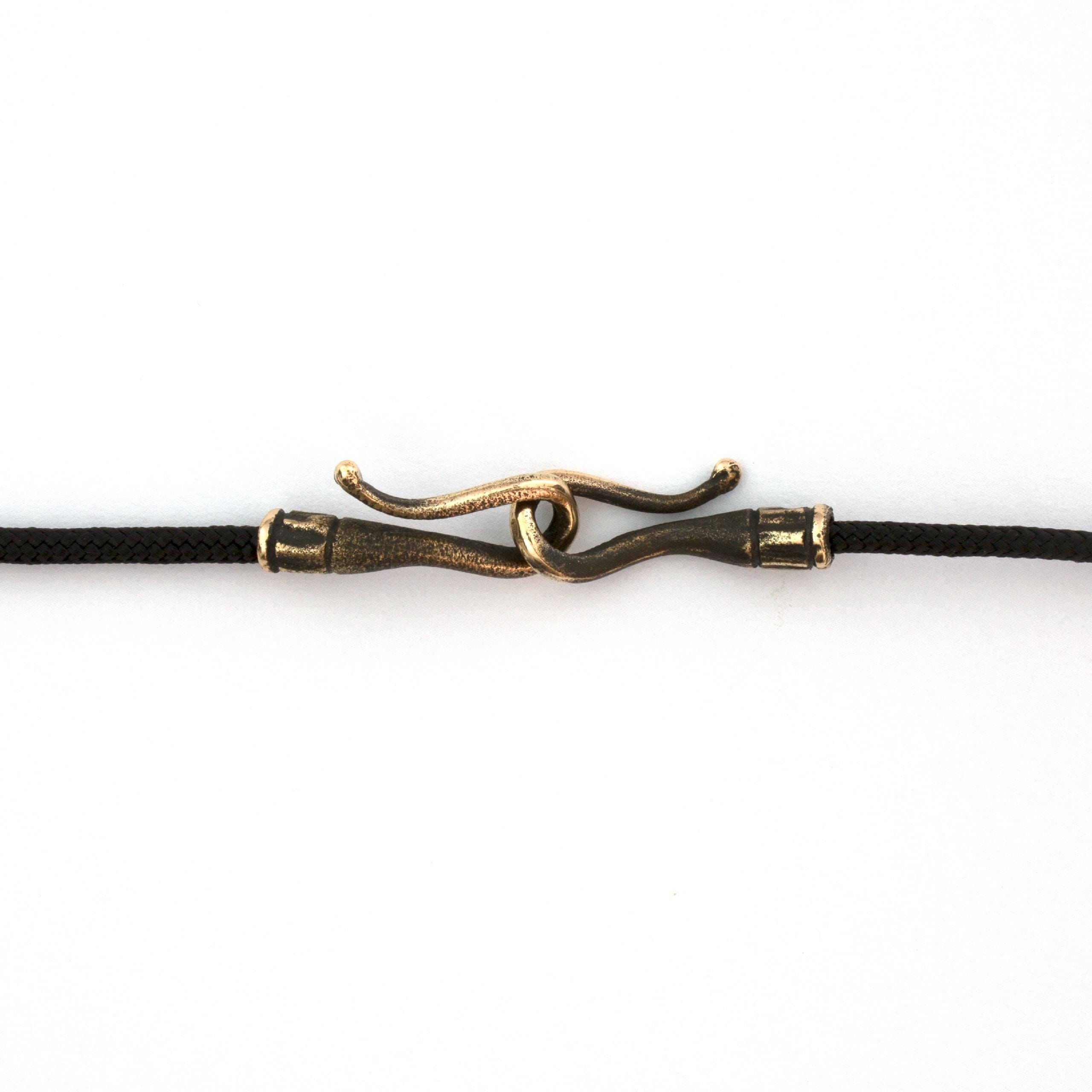 Thin Lanyard with a Fastening – practical accessory for jewelry by Vojtěška Vlčková. Bronze clasp with polyester cord ensures secure and elegant wear. Worldwide shipping.