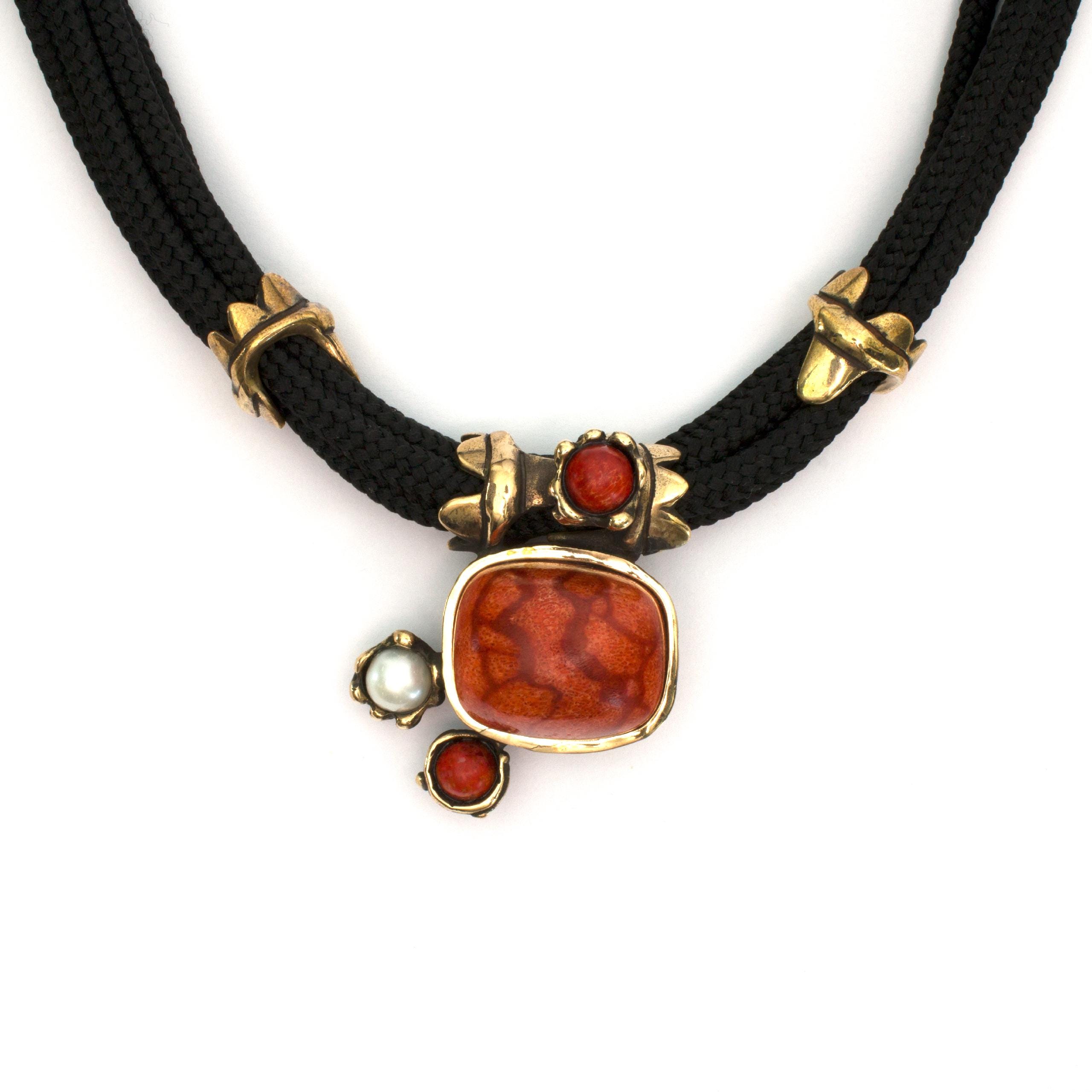 Bronze "Horse Collar" necklace by Vojtěška Vlčková. Authorial jewel with coral and pearls cast using lost wax technique. Worldwide shipping.