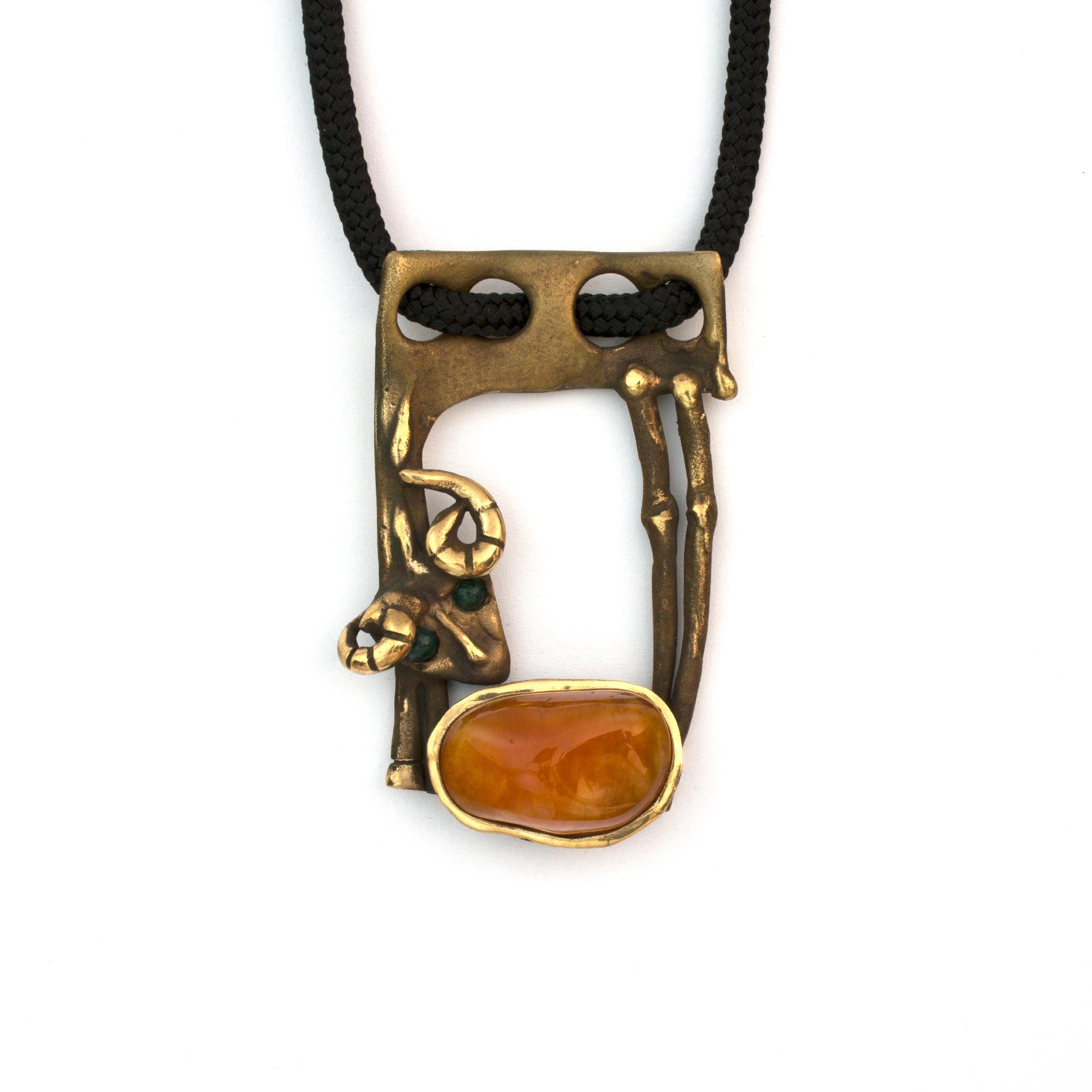 Bronze "Lamb" pendant necklace by Vojtěška Vlčková. Authorial jewel with carnelian cast using lost wax technique. Worldwide shipping.