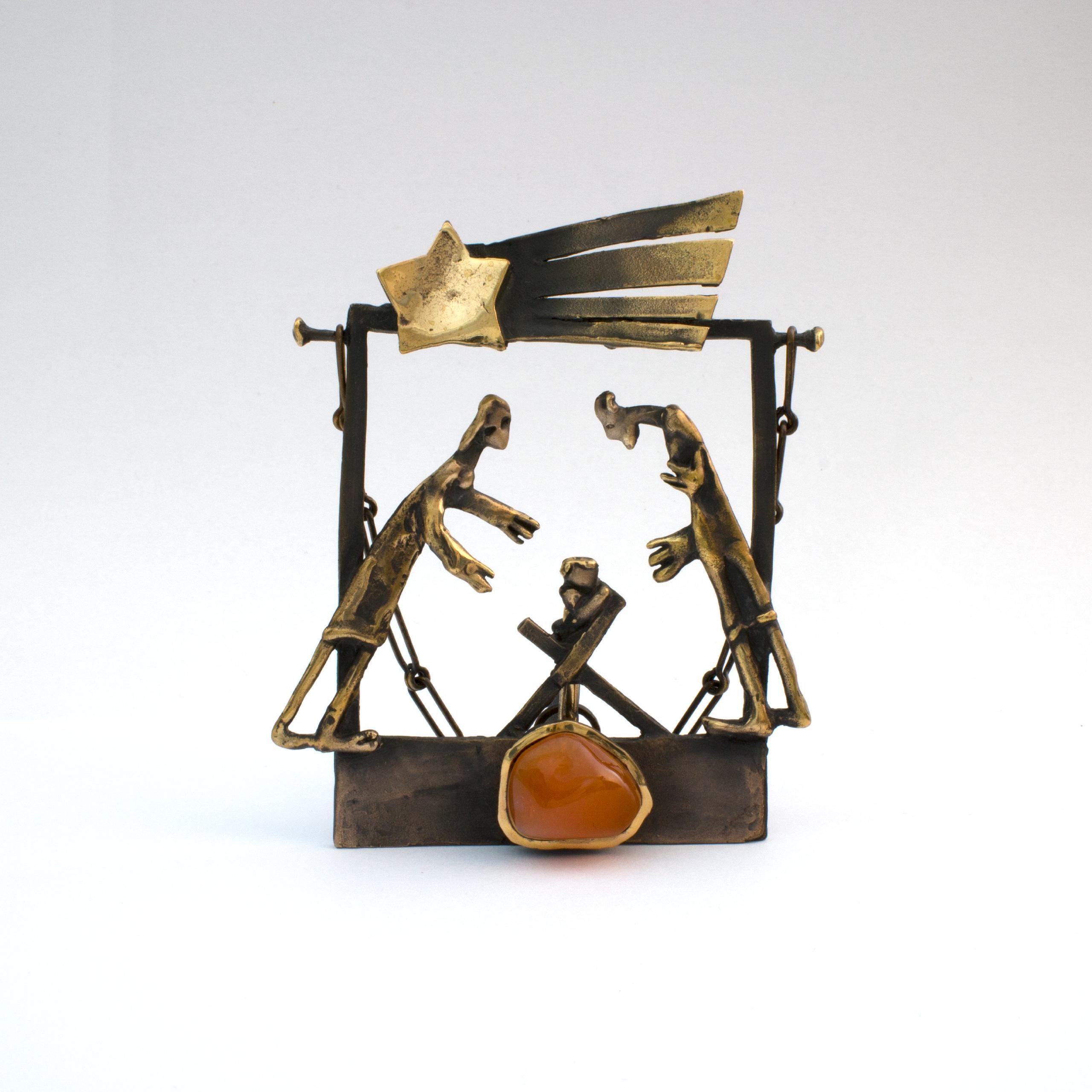 Bronze sculpture "Square Nativity Scene" by Vojtěška Vlčková. Modern interpretation of Christmas theme cast using lost wax technique with carnelian. Worldwide shipping.